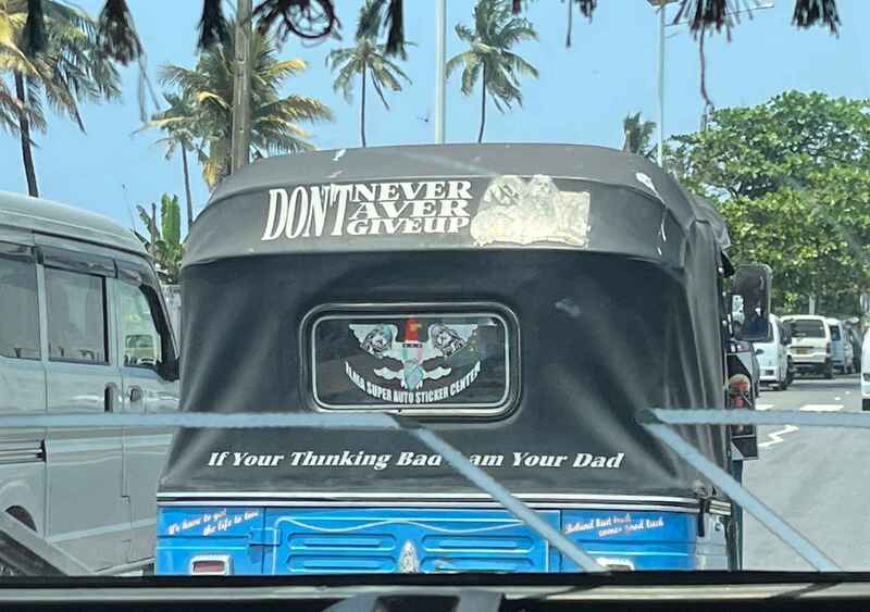 Sri Lankan TukTuk with some odd stickers on it